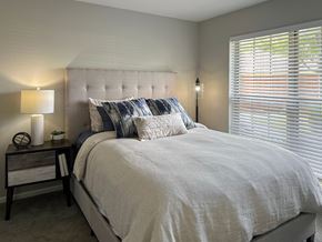 Lisle apartment for rent - furnished apartment bedroom with a bed and nightstand