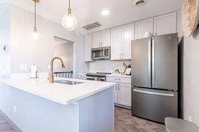 Gallatin apartment for rent - white kitchen with stainless steel appliances