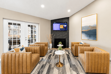 Lisle apartment for rent - A living room with a fireplace and a television on the wall.
