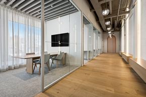 Chicago apartment for rent - A conference room with a long table and chairs.