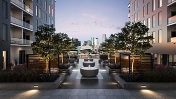 Quiet courtyard featuring private cabanas with beverage fridges