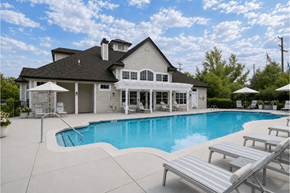 Aurora apartment for rent - A large house with a pool in the backyard.