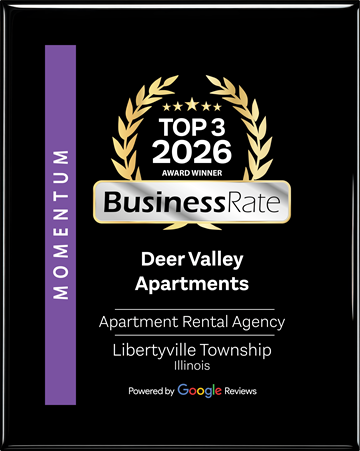 Lake Bluff apartment for rent - A black and gold award sign for Deer Valley Apartments.
