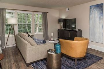 Dearborn apartment for rent - a living room with a couch and a television