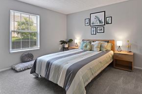 Columbus apartment for rent - a bedroom with a bed and a window