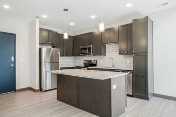 2-Bed suede th #145 - kitchen and front entry