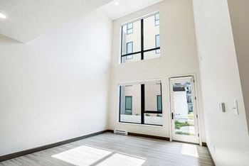 2-Bed suede th #145 - living room/dining room windows