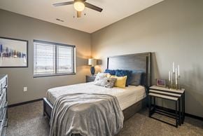 West Des Moines apartment for rent - Bedroom with ceiling fan and natural lighting at 360 at Jordan West best new apartments West Des Moines IA 50266
