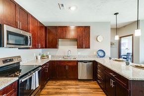 West Des Moines apartment for rent - Spacious kitchen with granite countertops of 2 bedroom apartment for rent at 360 at Jordan West best new apartments West Des Moines IA 50266