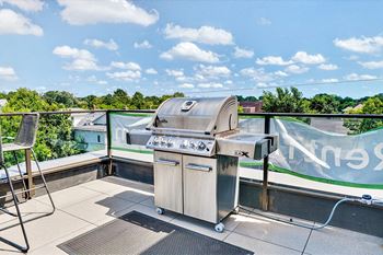 Rooftop patio with outdoor grill