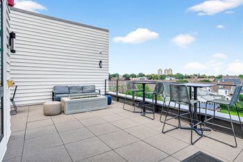 Rooftop patio with outdoor grill