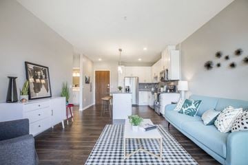 Woodbury apartment for rent - a living room with a couch and a table