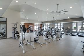 Woodbury apartment for rent - Large fitness center with free weights, weightlifting machines and cardio equipment at Ascend at Woodbury MN 55129 new luxury apartments