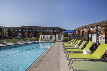 Exteriors pool side lounge chairs and cabanas