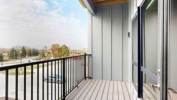 One-bed caribou with den (#205) - balcony and bedroom window