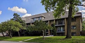 Lincoln apartment for rent - An apartment building with mature trees in front of it