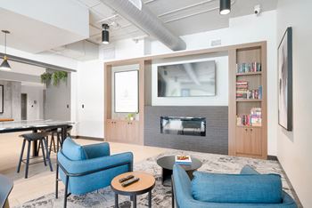 First floor entertainment suite with tv, high-speed internet, and areas to work from home