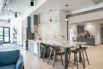 First floor entertainment suite with tv, high-speed internet, and areas to work from home