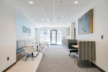 First floor entertainment suite with tv, high-speed internet, and areas to work from home