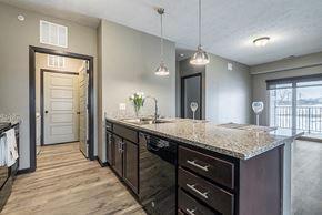 Lincoln townhouse for rent - Kitchen with granite counters and island at North Pointe Villas