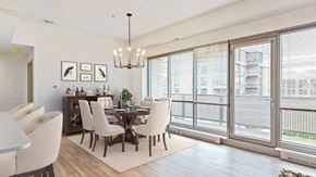 Omaha apartment for rent - Enjoy the scenic views from the floor-to-ceiling windows in the dining and living area of a 2 bedroom penthouse floor plan at Midtown Crossing Apartments Omaha