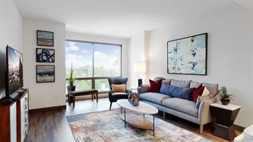 Omaha apartment for rent - a living room with a couch and a large window