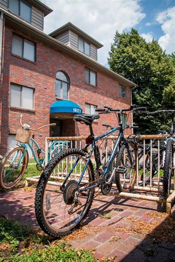 Exteriors-packard house bike racks with building view
