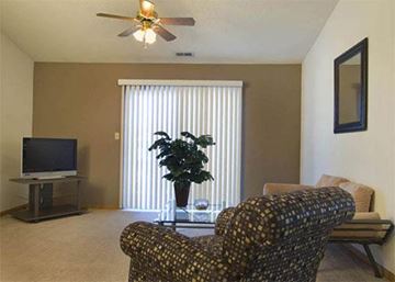 Lincoln apartment for rent - a living room with a couch and a television
