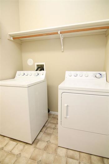 Interiors-ridge pointe villas washroom with washing machine