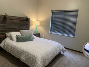 Lincoln townhouse for rent - Furnished bed room with full size bed at north pointe villas in lincoln nebraska