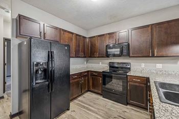 Side-by-side refrigerator with ice maker and water dispenser
