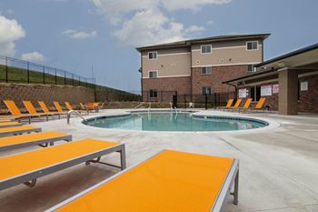 Exteriors-new west clubhouse pool and seating
