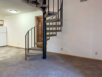 Three-bed montello loft (#29) - living room spiral staircase