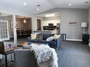 Community clubhouse with lounge spaces and full kitchen