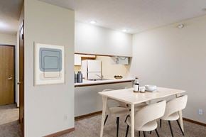 Lincoln apartment for rent - A dining room with a table and chairs.