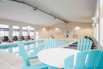 Pinebrook indoor pool with lounge seating