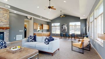 Lincoln triplex for rent - a living room with a couch and a table