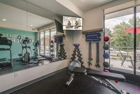 Minneapolis apartment for rent - Fitness Center with cardio equipment at The Central apartments near downtown Minneapolis MN 55408