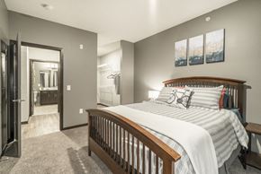 Omaha apartment for rent - 1-bedroom apartment with king-size bed and walk-in closet at The Conrad in Blackstone District Omaha