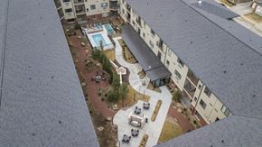 Omaha apartment for rent - Courtyard with pool at The Conrad apartments in Blackstone District Omaha NE