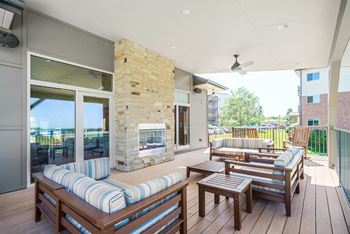 Outdoor lounge areas with fireplaces