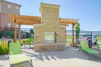 Outdoor lounge areas with fireplaces