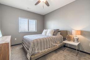 Lincoln apartment for rent - Living room with ceiling fan at The Flats at 84 in southeast Lincoln NE 68516