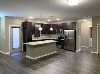 Kitchens created for chefs with large islands and peninsulas, ample storage and upscale appliances