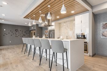 Exteriors-gourmet kitchen for entertaining in our amenity space