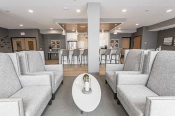 Exteriors-cushy seating near the gourmet kitchen in our amenity space
