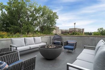 Exteriors large sitting area around the fire pit.