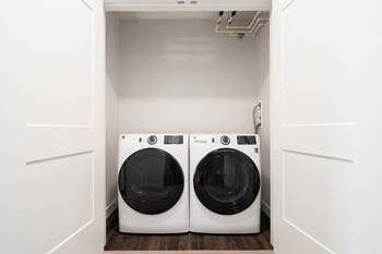 Full-size washer and dryer in each home
