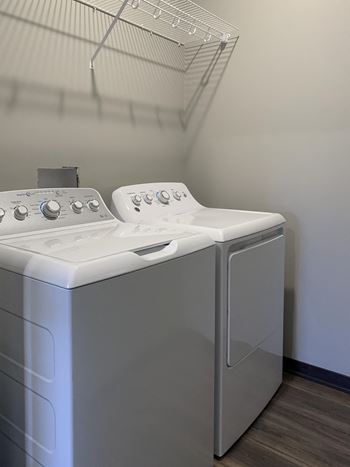 Full-size washer and dryer in each home