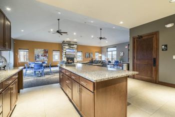Exteriors-kitchen in clubhouse that's available to residents